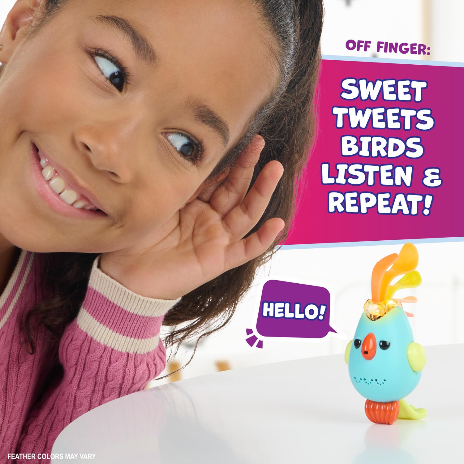 Side view of Debbie the pink Fingerlings bird showing the wing buttons