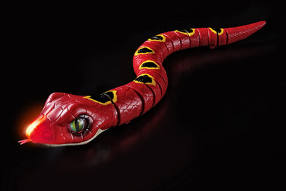 Side profile of the battery powered slithering snake toy showing the realistic moving eyeball details
