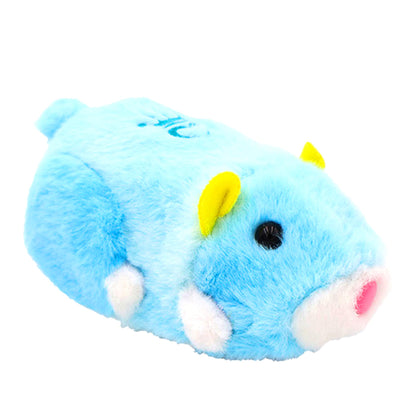 Close up view of the motorized Sophie hamster toy navigating the city tracks.
