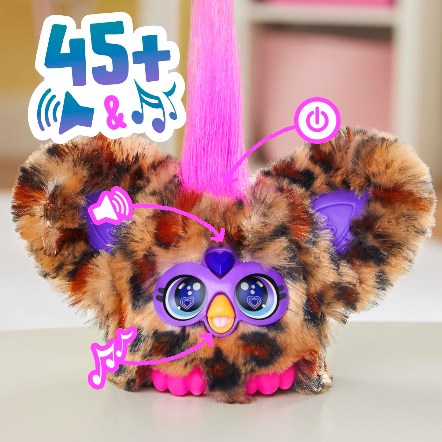 Mini cheetah electronic pet showing the attached removable keychain clip feature