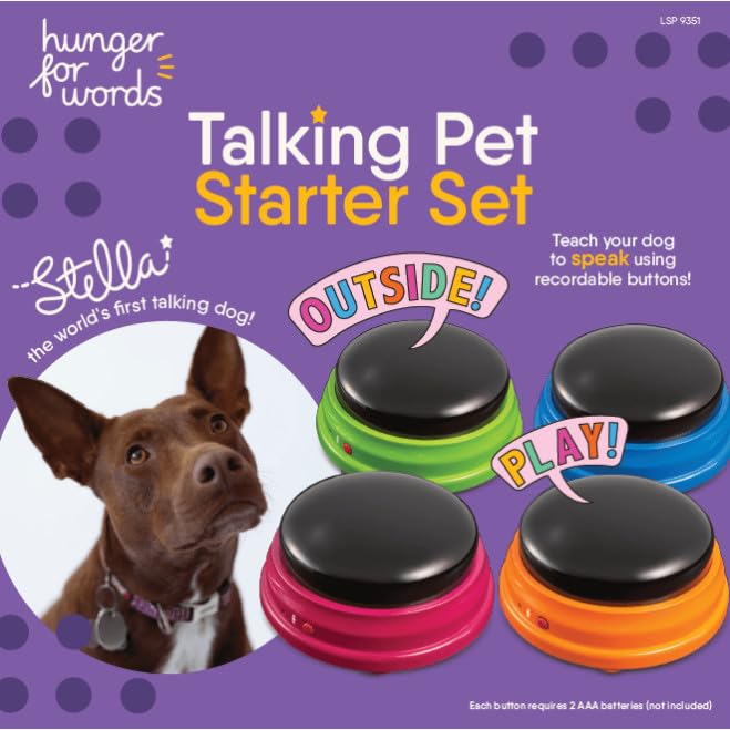 Four recordable dog communication buttons in blue green orange and red arranged flat on the floor