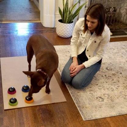 Included instructional guide written by speech pathologist Christina Hunger detailing dog language teaching steps