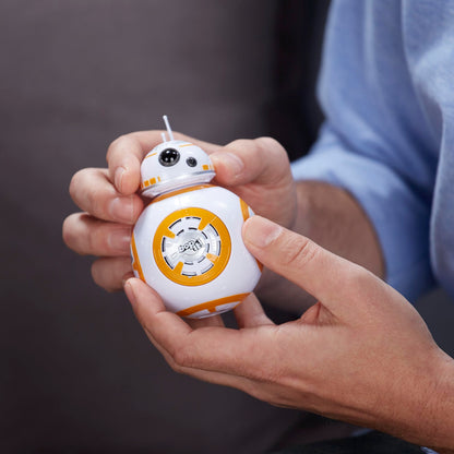Hasbro Star Wars BB8 Bop It toy showing the interactive twist and pull features
