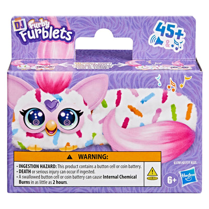 Furby DJ Furblets Berry-Cup-Cake interactive plush being stretched to demonstrate the music speed up feature