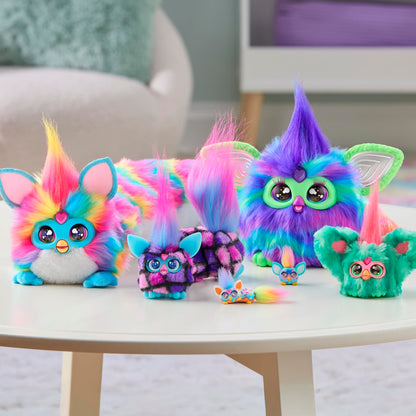 Product packaging for the USA imported Furby DJ Furblets Berry-Cup-Cake electronic toy with included batteries