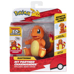 Jazwares Charmander electronic figure with arms moving and mouth glowing during an interaction simulation.