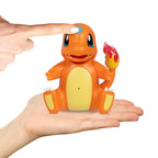 Close up view of the durable plastic design and electronic details of the My Partner Charmander figure.