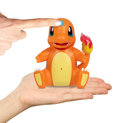 Close up view of the durable plastic design and electronic details of the My Partner Charmander figure.