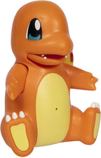 PokÃ©mon Charmander interactive toy executing its signature charge attack and dancing mode expressions.
