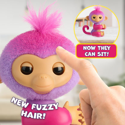 Fingerlings Charli interactive toy being flipped upside down for playful reactions