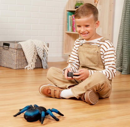 Terra by Battat electronic spider toy top angle displaying blue and black stripes