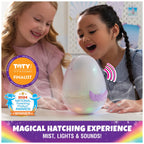 Hatchimals Alive Pufficorn plush character emerging from its egg with magical mist and rainbow light effects.