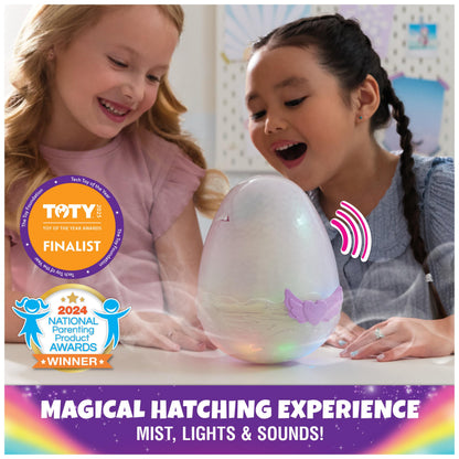 Hatchimals Alive Pufficorn plush character emerging from its egg with magical mist and rainbow light effects.