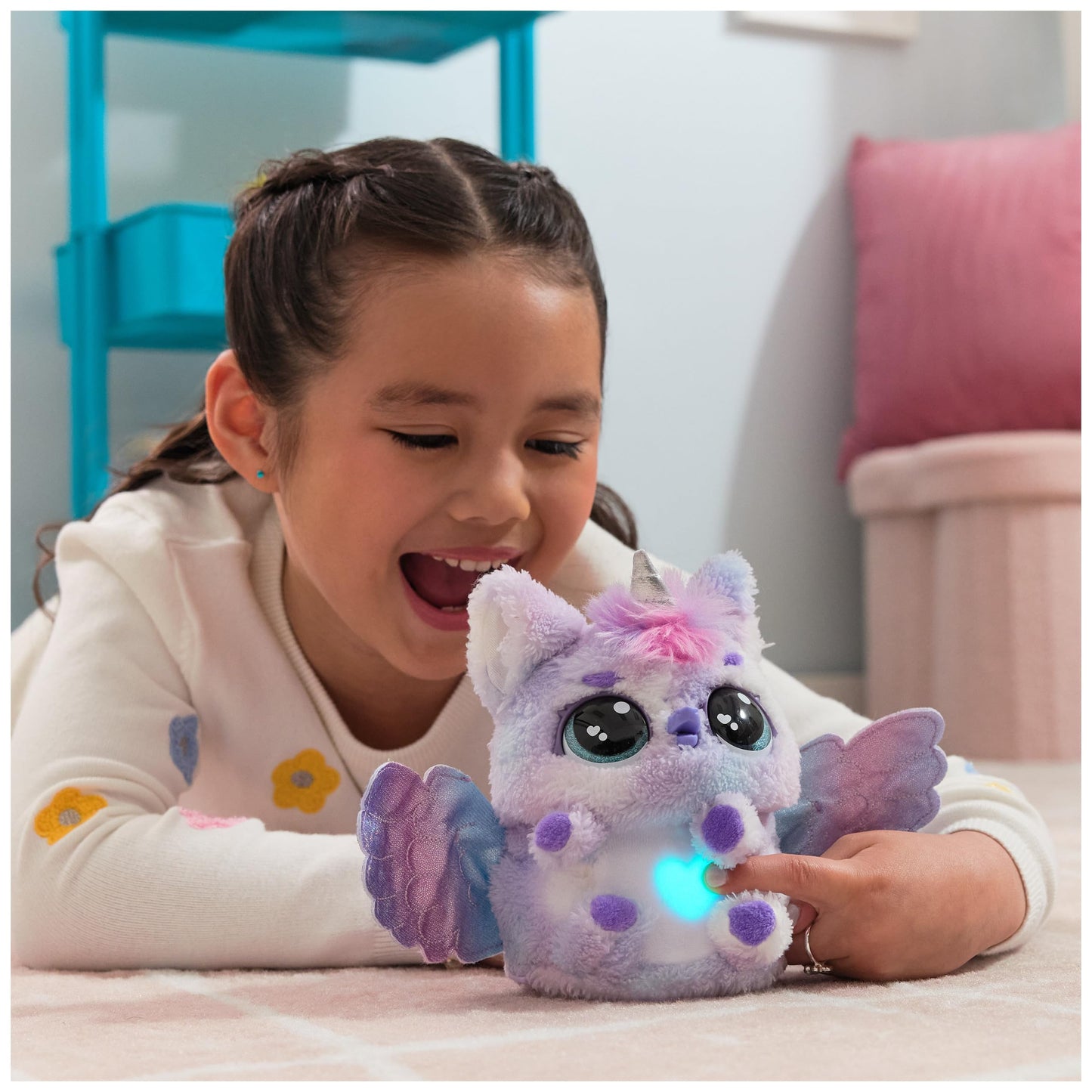 Complete contents of the toy box including the main egg, instruction booklet, and internal electronic components.