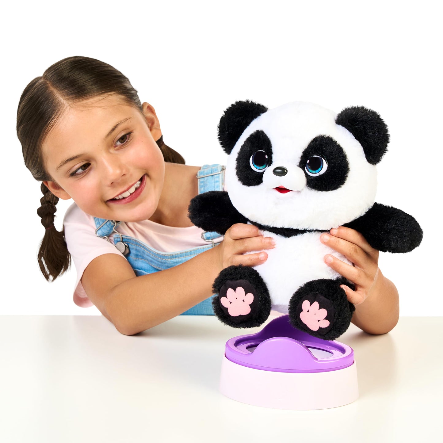 Little Live Pets Panda ChuChu kicking its feet during interactive play session