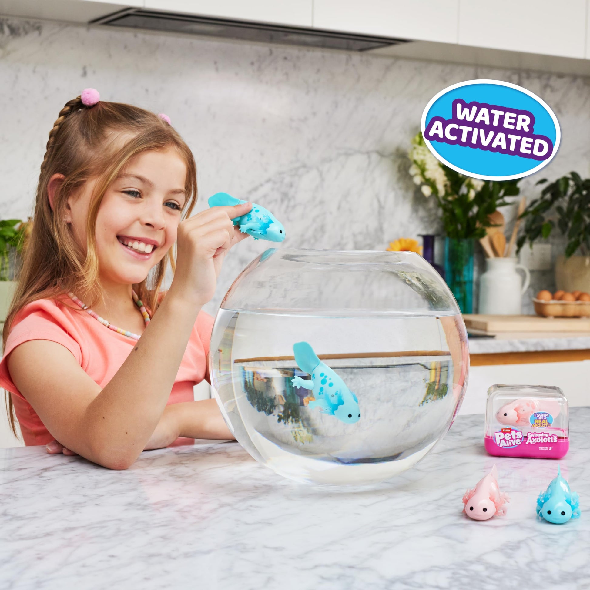 Children playing with the interactive Pets Alive robotic axolotl toys during bath time