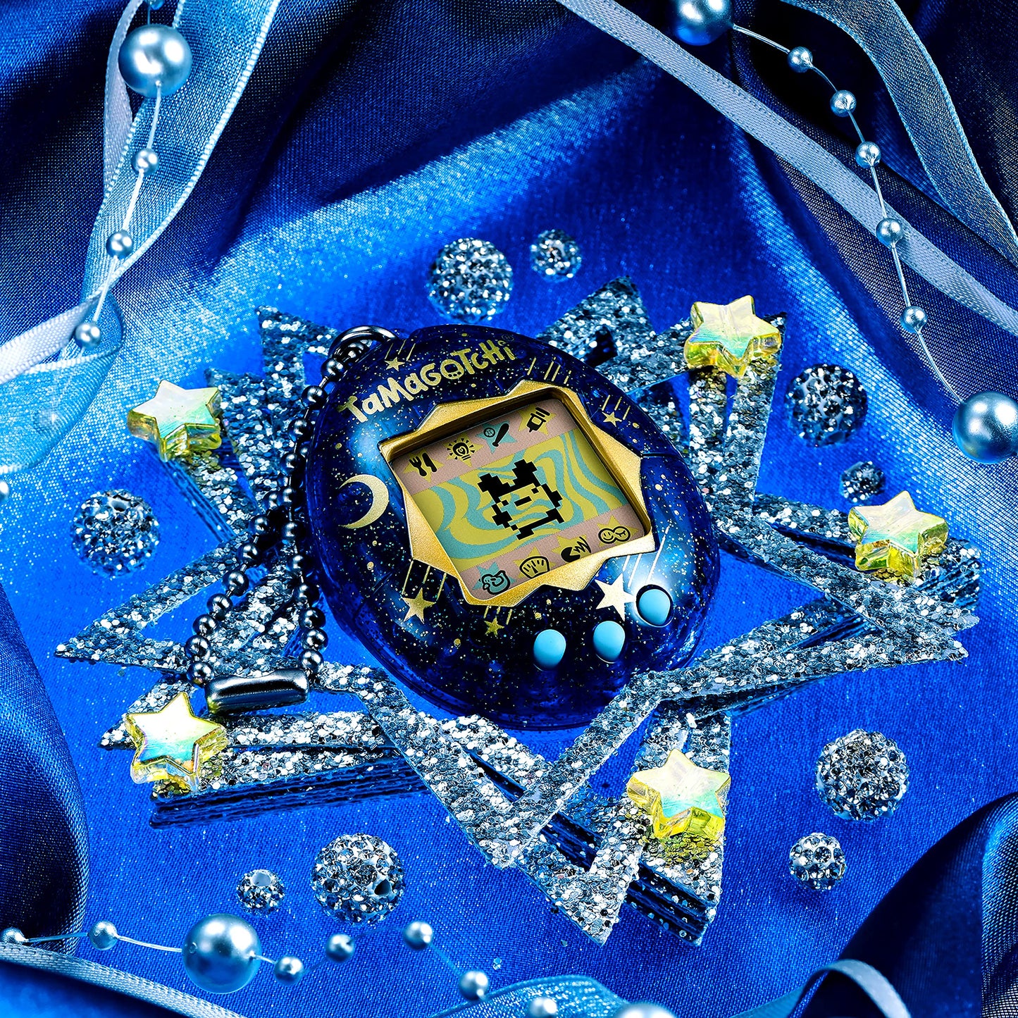 Authentic USA imported Tamagotchi Original Starry Shower packaging with generation two character artwork.
