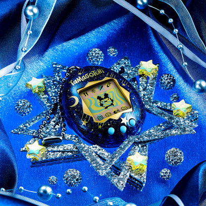 Authentic USA imported Tamagotchi Original Starry Shower packaging with generation two character artwork.