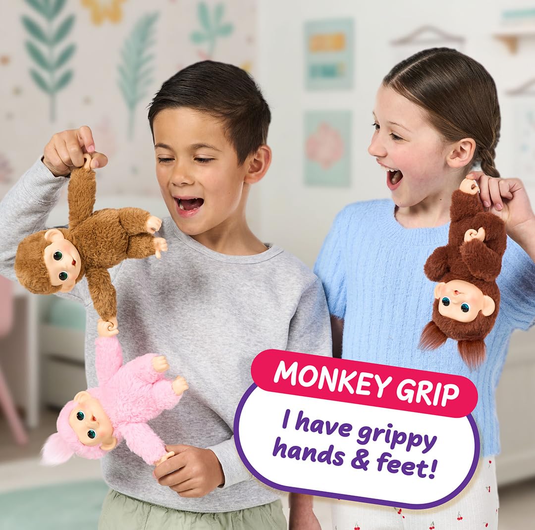 Little Live Pets pink electronic baby monkey toy standing upright at seven point four inches.