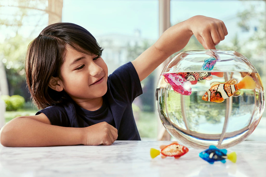 Robo Alive robotic swimming fish diving deep inside a family bathtub setup