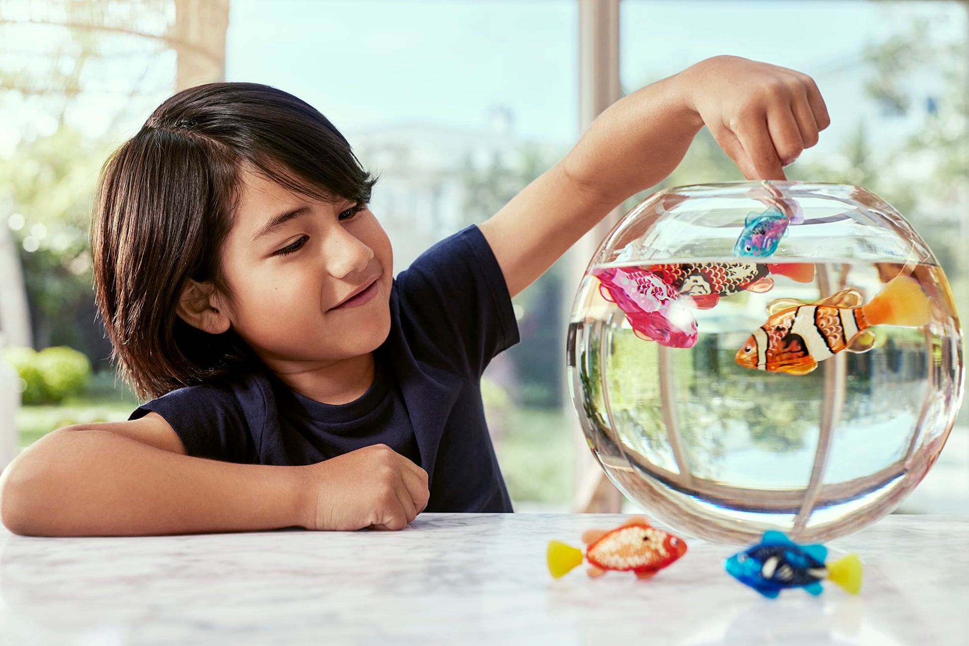 Robo Alive robotic swimming fish diving deep inside a family bathtub setup