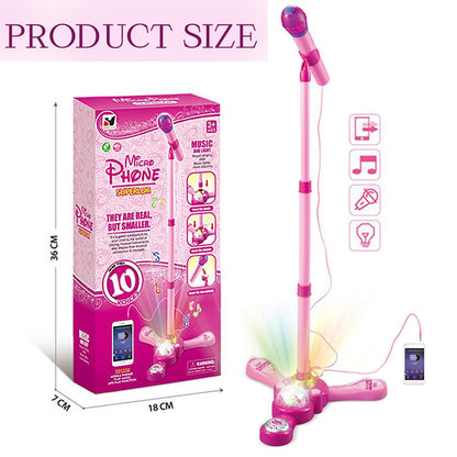 Auxiliary cable connecting a smartphone to the pink kids karaoke machine for custom song choices