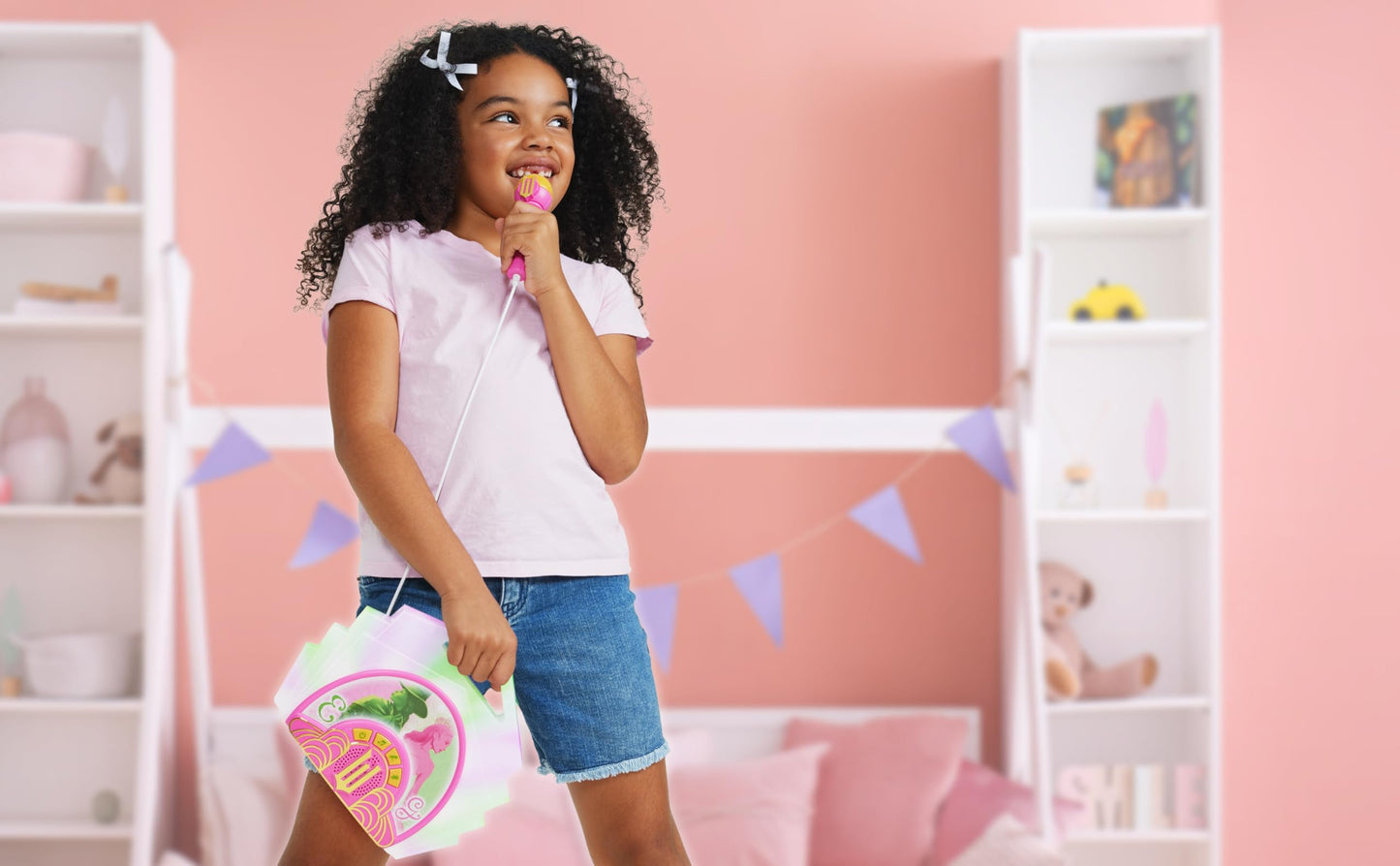 Side perspective showing the integrated carrying handle of the portable toy speaker