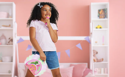 Side perspective showing the integrated carrying handle of the portable toy speaker