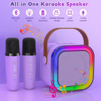 Two matching pink wireless microphones designed for child handle grip and duet singing sessions.