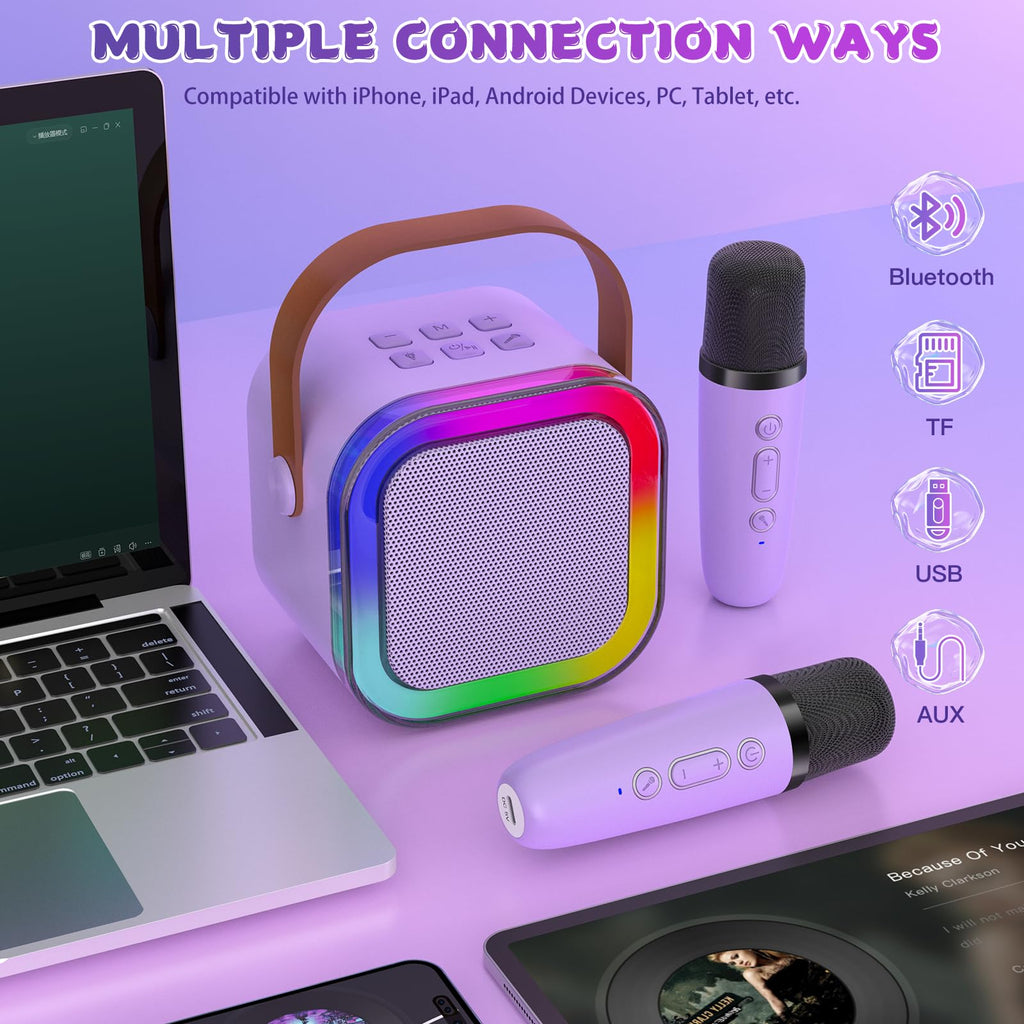 Haomuren portable Bluetooth party speaker illuminated with rotating multi color LED lights in a dim room.