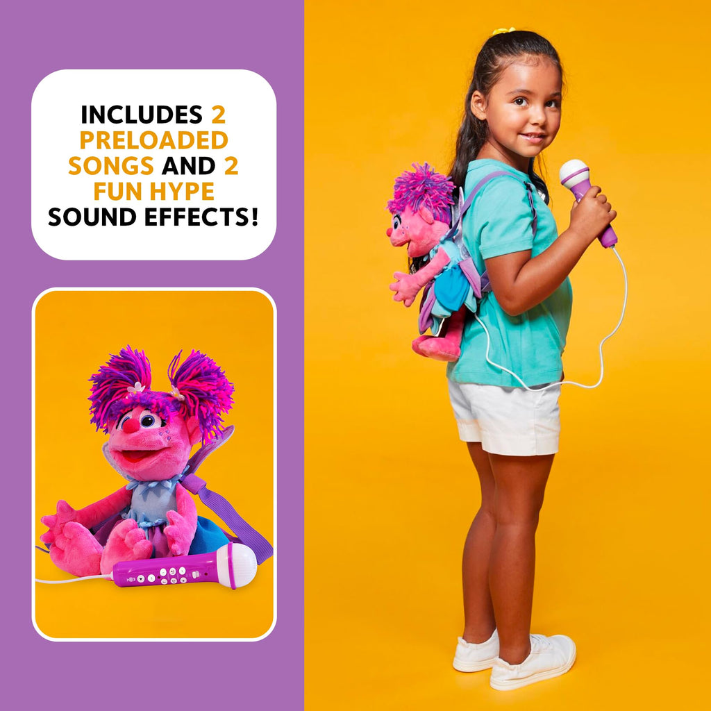 Side profile of the interactive Sesame Street karaoke machine toy demonstrating the attached wired microphone cord.
