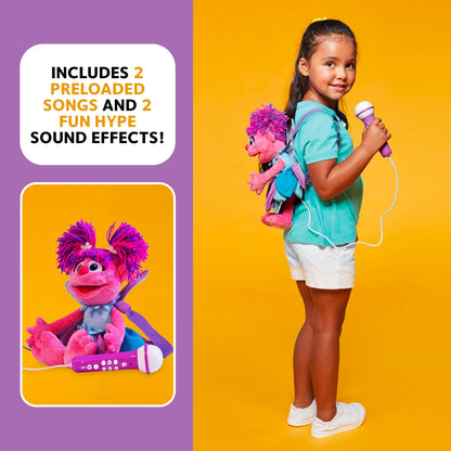 Side profile of the interactive Sesame Street karaoke machine toy demonstrating the attached wired microphone cord.