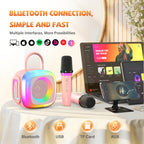 Close up of the two wireless microphones included with the SunTrok pink karaoke set