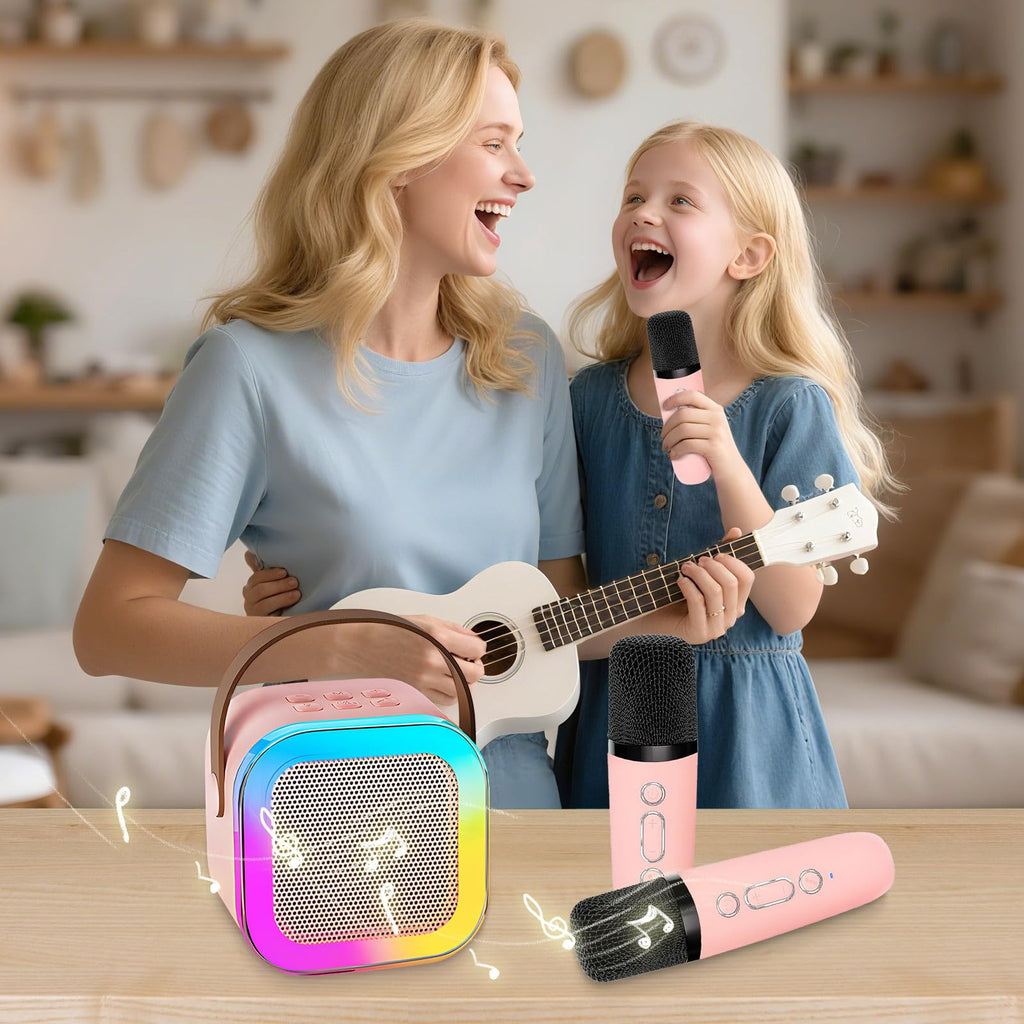 DEABOLAR mini singing machine showcasing the two included wireless microphones with protective clean hygienic sponge covers.