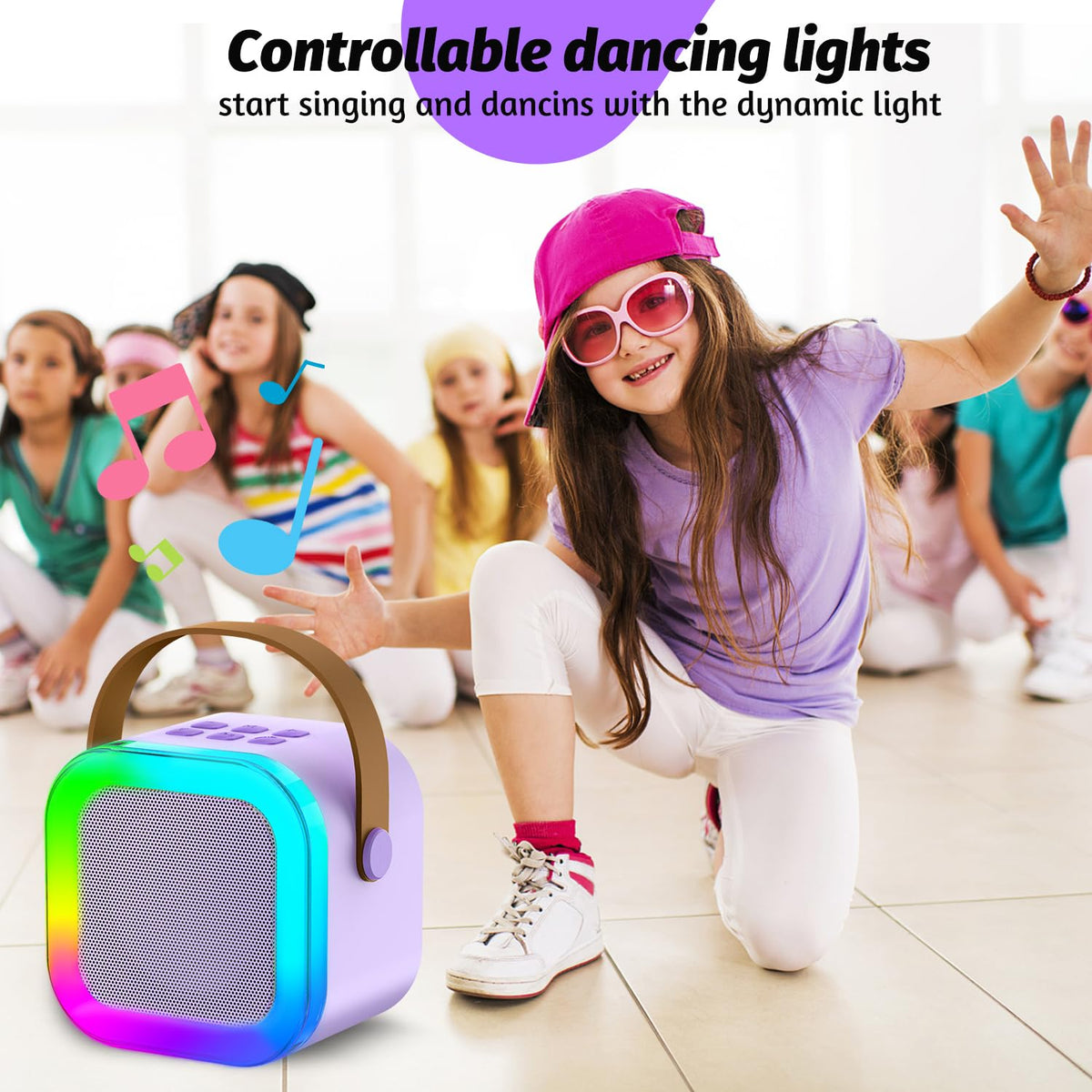 OUTUVAS electronic musical toy side angle displaying the simple button interface used to change voice effects and adjust volume.