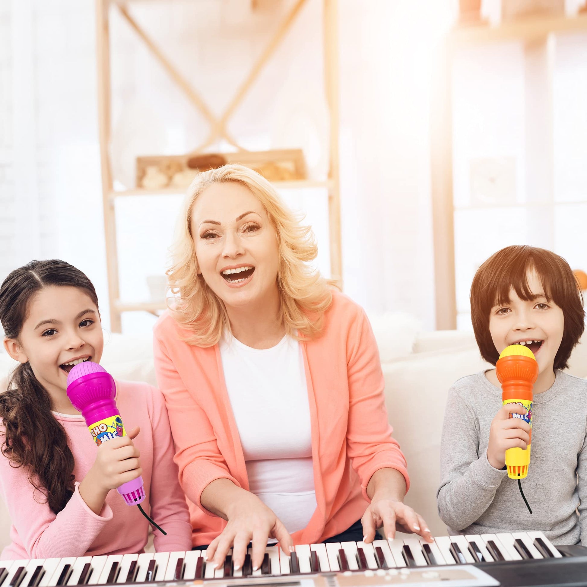 Assorted pink blue yellow and green retro voice amplifying microphones for toddlers