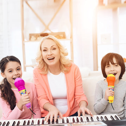 Assorted pink blue yellow and green retro voice amplifying microphones for toddlers