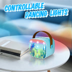 Zhipal Frozen theme karaoke speaker pulsing with colorful built in LED rhythm lights in a dark room.