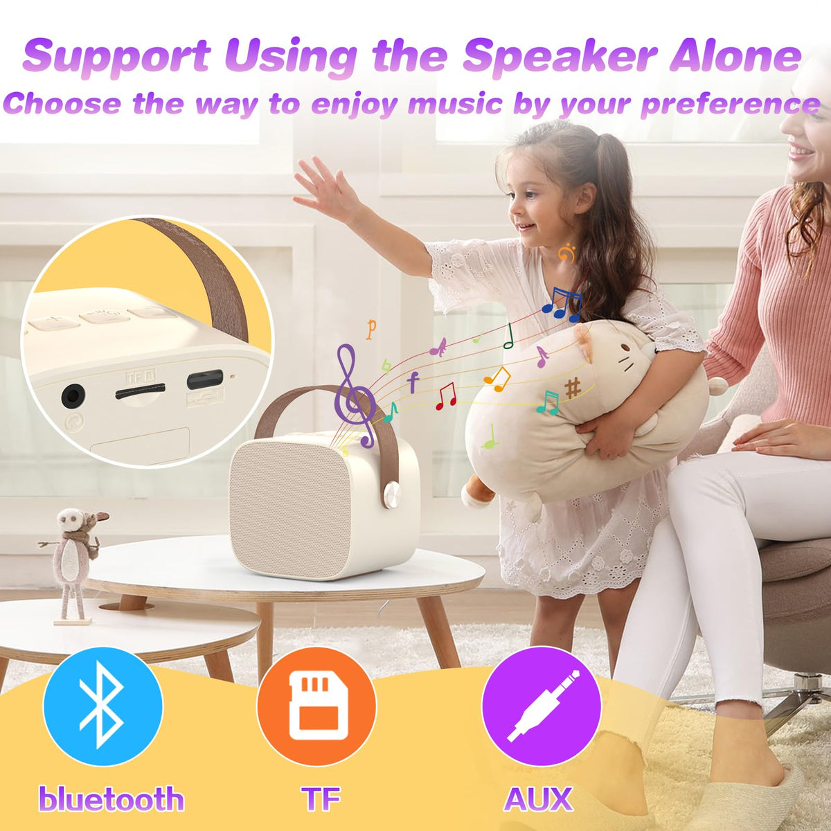 A child using the MEGUO portable karaoke machine at a lively birthday celebration.