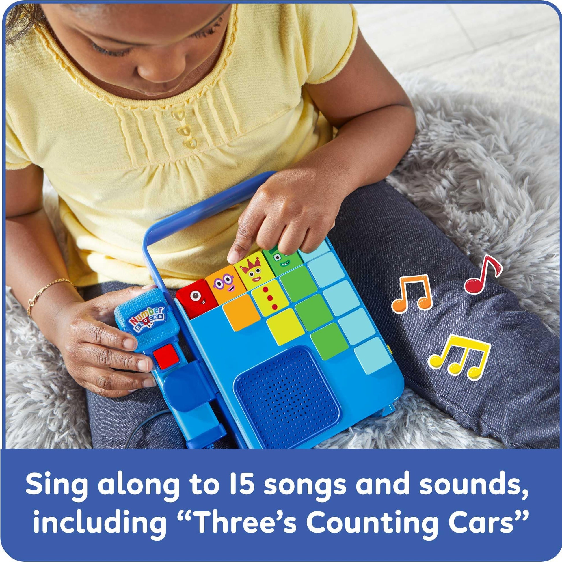 Hand2mind musical learning toy with built-in handle for portable preschool math activities.