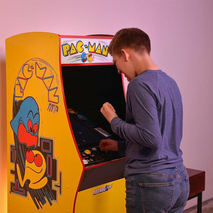Side view of Arcade1Up Pac-Man Deluxe arcade cabinet graphics