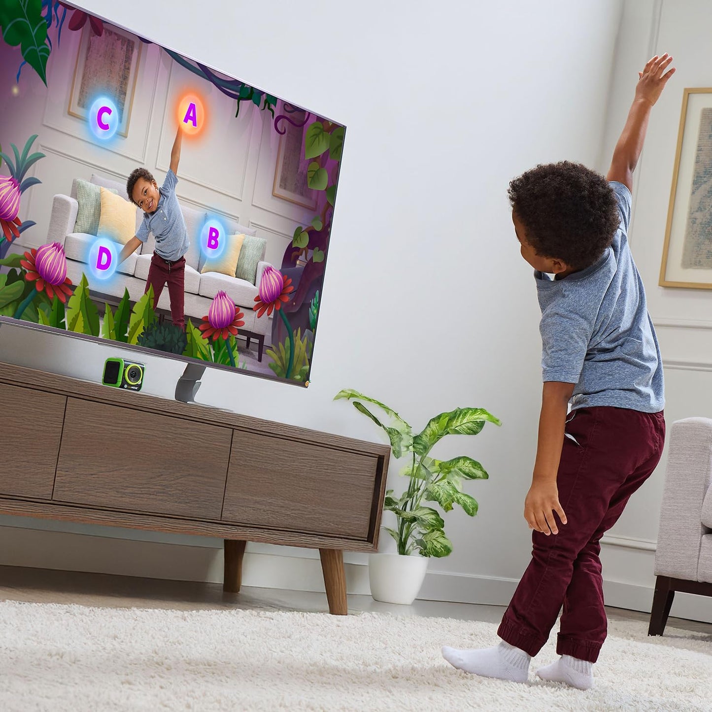 Child playing LeapFrog LeapMove motion-based game in a living room