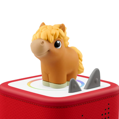 Three squishy silicone farm animal characters from the side illustrating the soft squeezable texture for small hands.