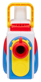 Portable story machine being carried by its built in handle for travel