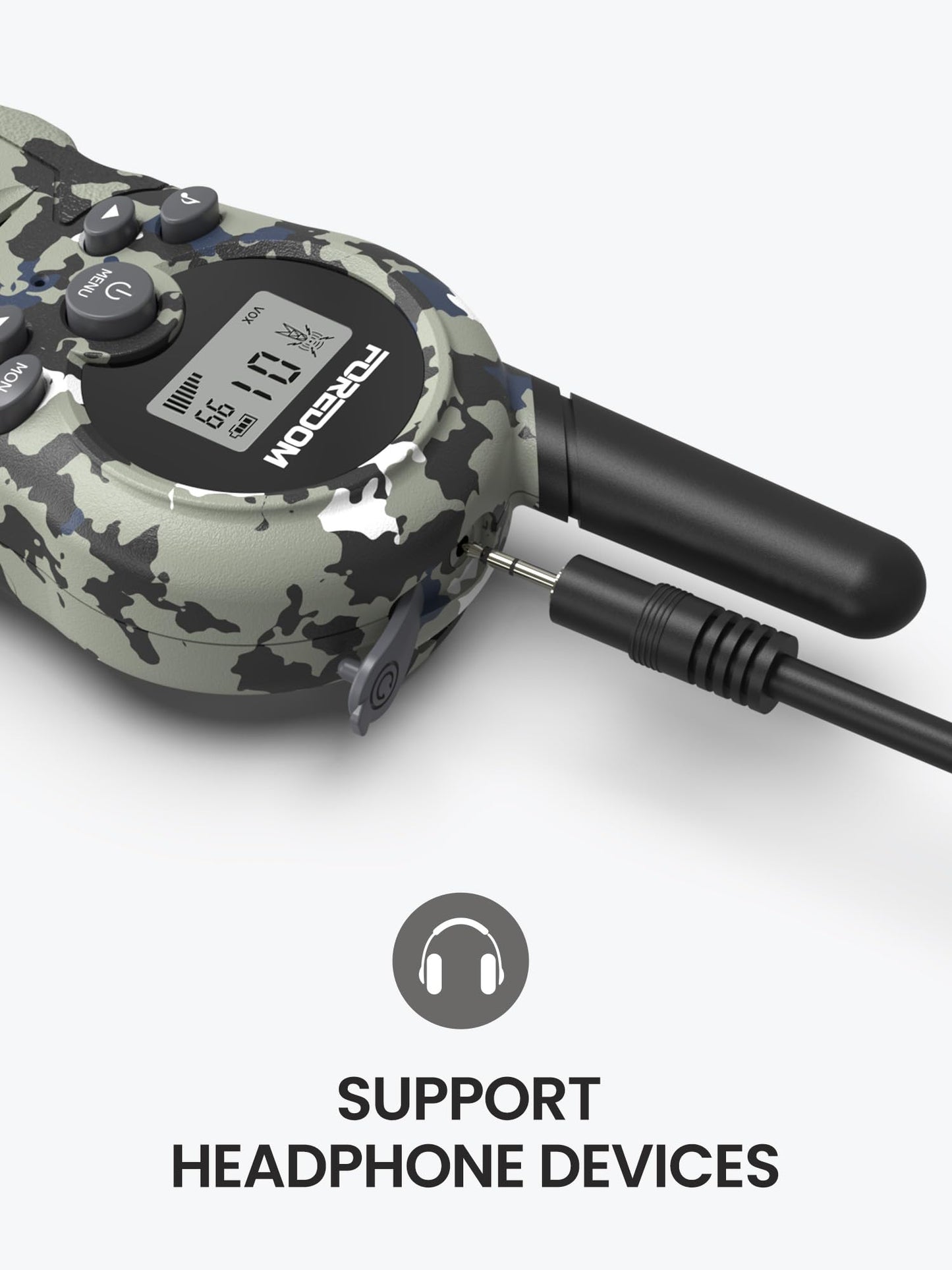 Top angle view showing the built in flashlight and earpiece jack connection on the toy radio