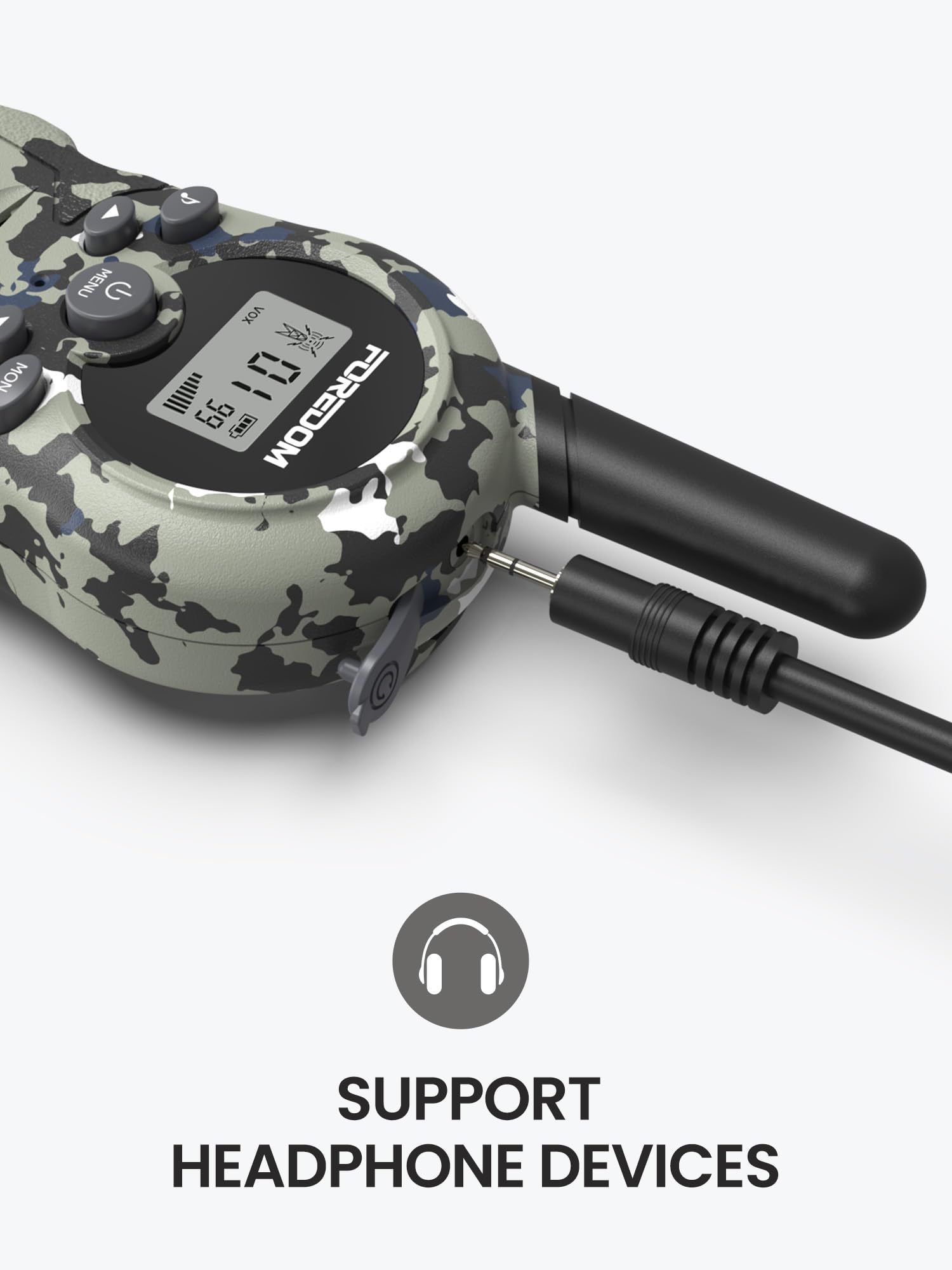 Top angle view showing the built in flashlight and earpiece jack connection on the toy radio