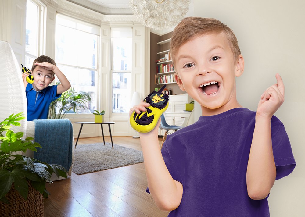 Back view of child friendly two way radio showing the integrated belt clip assembly