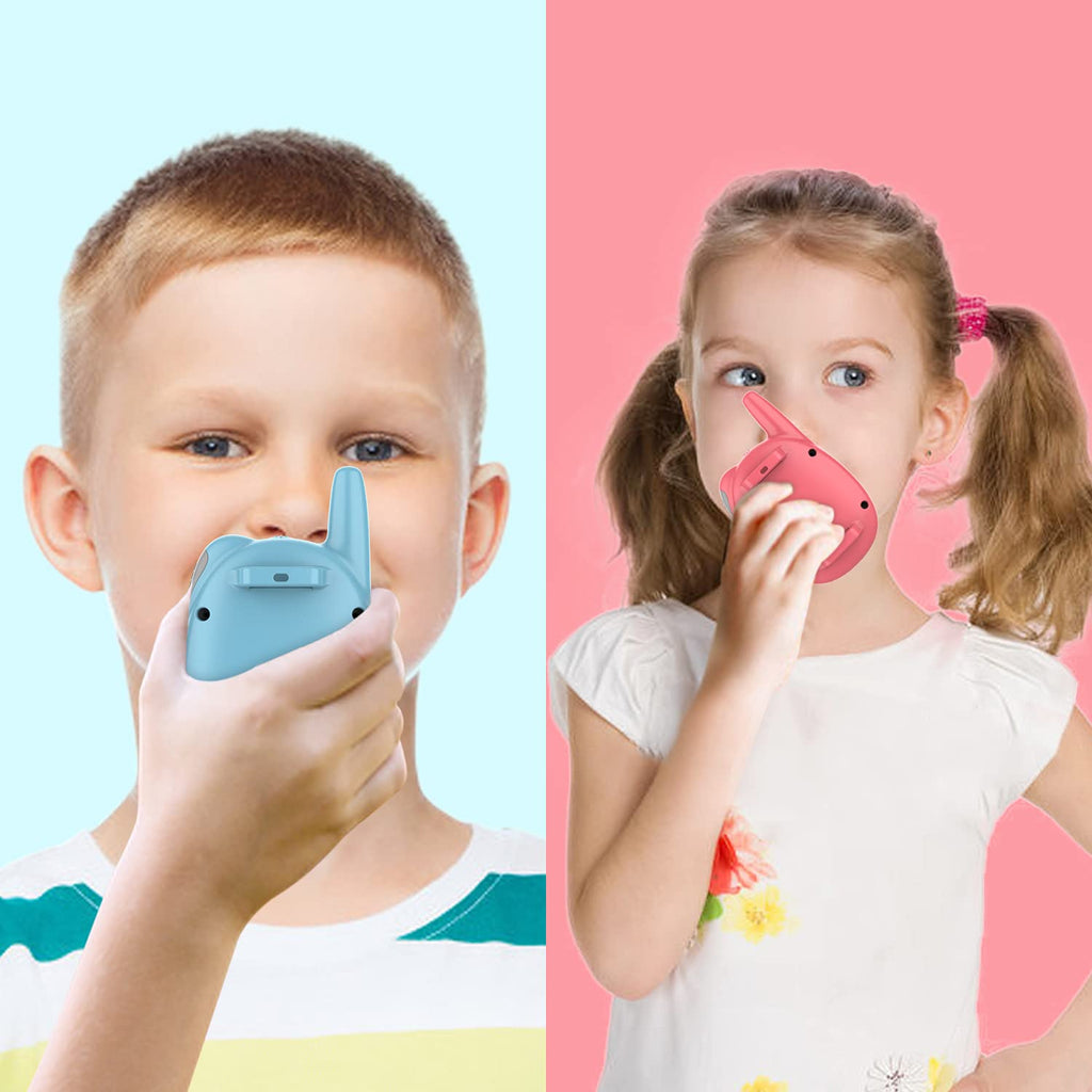 Pink and blue Qniglo children two way radios displaying the backlit LED screen and push to talk button.
