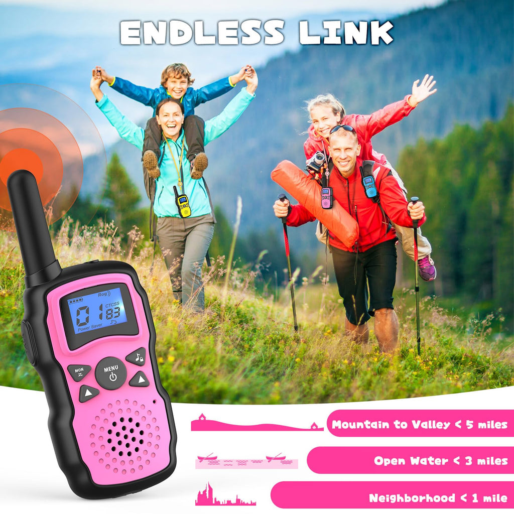Side view of child holding pink walkie talkie