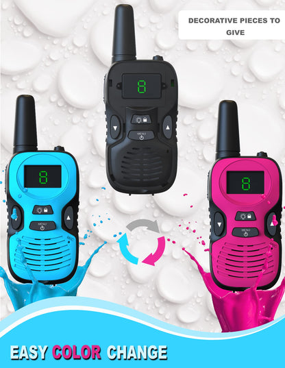 Four children two way radios with interchangeable colored shells displayed with charging cables